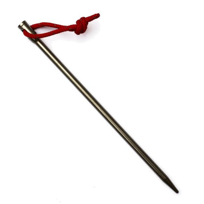 Titanium Metal tent spike with a red string tied around it on a white background