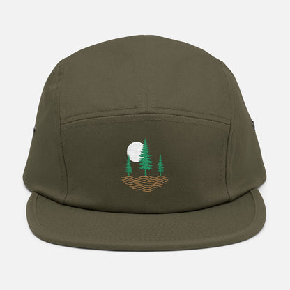 Front view of olive low-profile cap with embroidered design of three pine trees, a rising sun, and ripple lines symbolizing the earth.