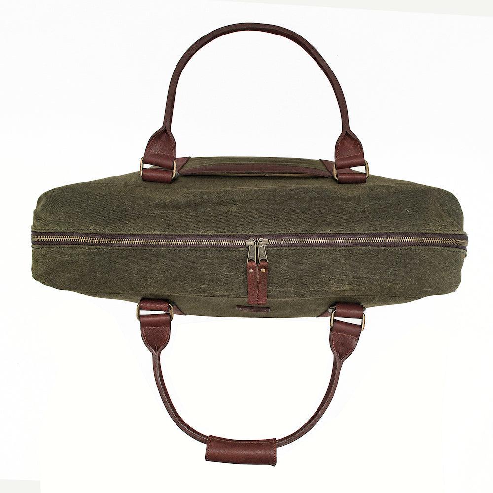 Top zipped view of the White Wing Waxed Canvas Large Cooler - 35L in Smoke-Forest by Mission Mercantile Leather Goods.