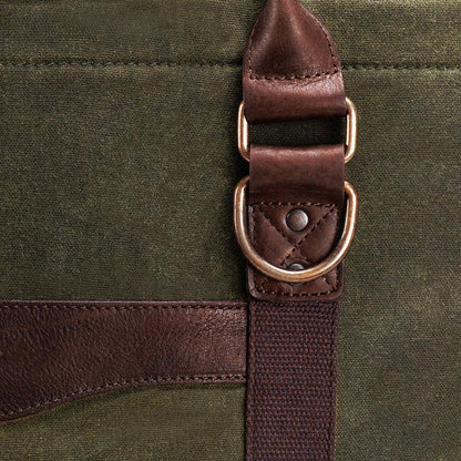 Detail  of fabric and buckle on the White Wing Waxed Canvas Large Cooler - 35L in Smoke-Forest by Mission Mercantile Leather Goods.