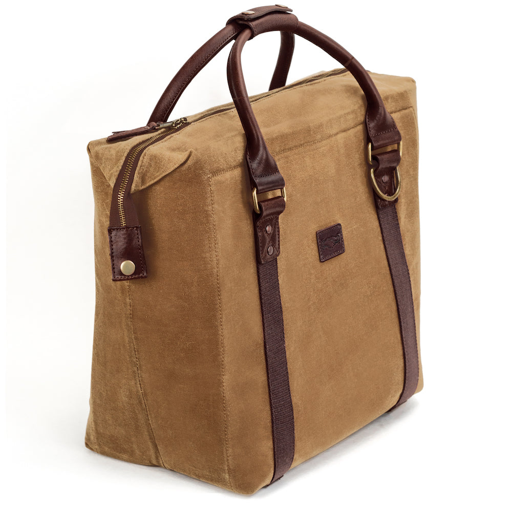 Side view ofWhite Wing Waxed Canvas Large Cooler - 35L in Smoke-Brown by Mission Mercantile Leather Goods.