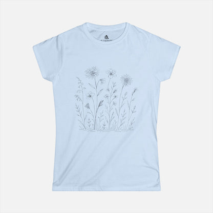 Women's light blue Wildflower Breeze T-Shirt displayed on a white background, highlighting its nature-inspired wildflower design and soft fabric.