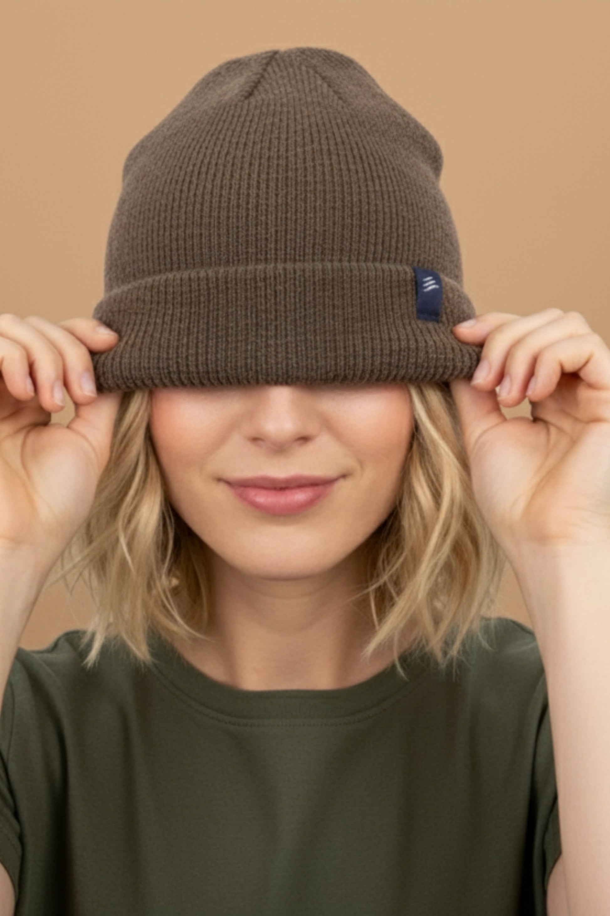 Yak Wool Beanie Hats by United By Blue sold by Kempain Family Outfitters worn by female model.